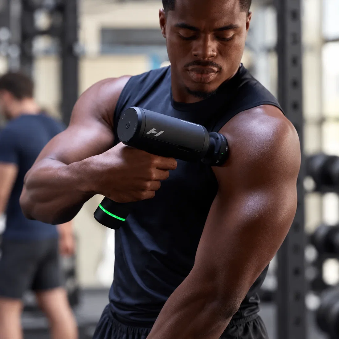 Athlete using Hyperice Hypervolt 3 Pro Massage Gun