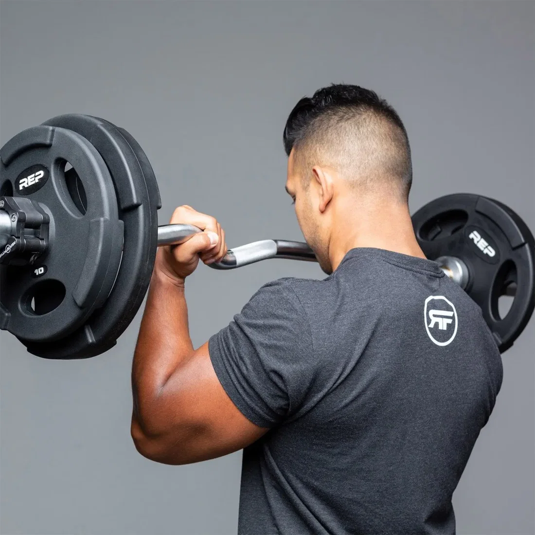 Athlete training with REP Fitness Curl Bar